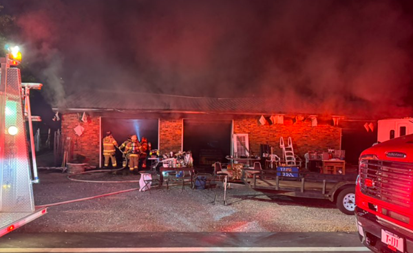 Structure fire in Stella injures shop owner