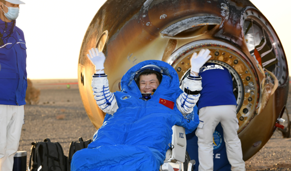 Chinese astronauts return to Earth after delay caused by damage from space debris