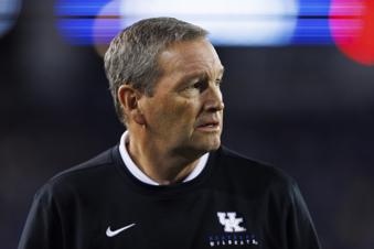 Former Kentucky swimmers sue ex-coaches, AD Barnhart; alleges 'sexually hostile environment'