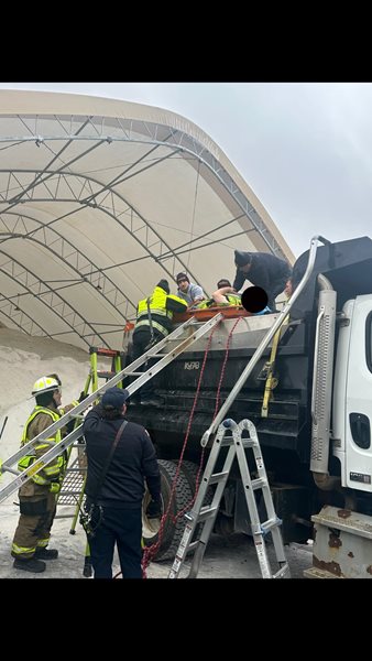 Worker trapped under auger of McCracken salt truck