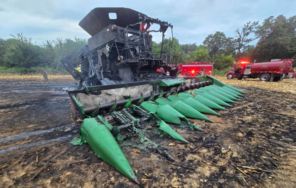 Combine, corn field burn in Graves County