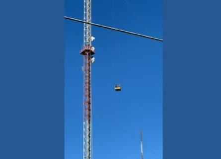 Man restrained, rescued after climbing 900 feet up St. Louis TV tower
