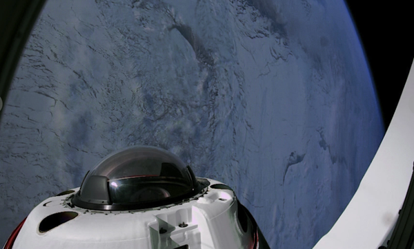 Space tourists return to Earth after private flight over poles