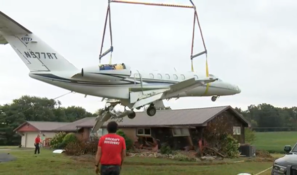 Jet that ran off runway and hit Mayfield house removed, road reopened