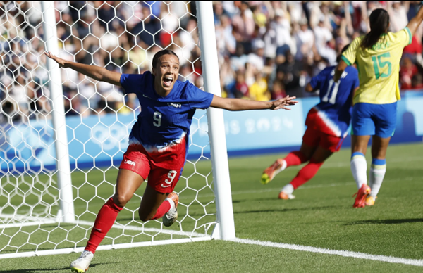 USA wins gold in womens soccer, mens basketball; 3 more in track