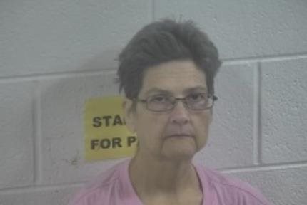 Murray woman charged with forgery and identity theft