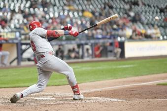 Cardinals push past Brewers 7-4 in 12 innings