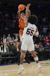 Abmas hits game-winner as No. 19 Texas outlasts Louisville 81-80 