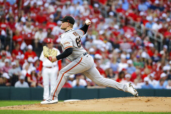 Logan solid for 6, Giants beat Cardinals for 6th win in row