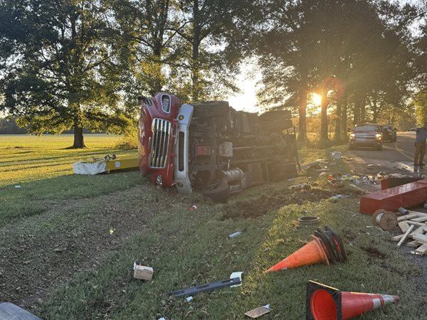 Bucket truck overturns in Calloway County