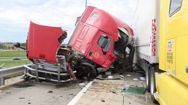 Two semis crash, cause 10-mile backup on I-24