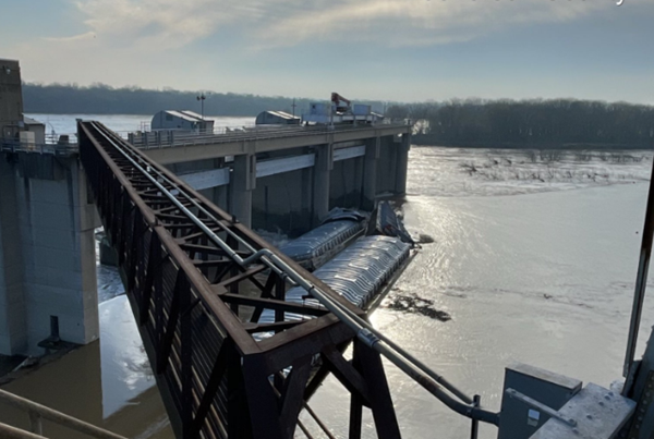 Barges trapped against Louisville dam may have to remain in place during high water
