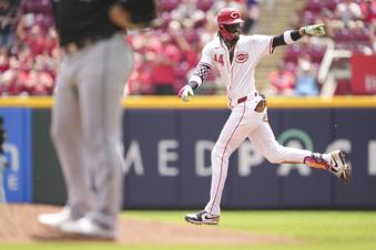 Reds hit 3 home runs, Martinez throws 7 shutout innings to snap 3-game skid, beat White Sox 7-1