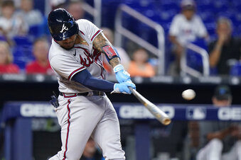 Tromp's 3 hits, 3 RBIs lead Braves over Marlins in Game 1