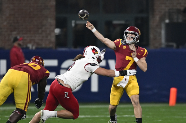 USC's backup QB throws 6 TD passes, dumps Louisville 42-28 in Holiday Bowl