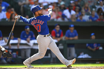 Contreras hits 2 homers, Cubs outlast contending O's 3-2