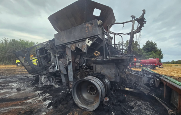 Combine, corn field burn in Graves County