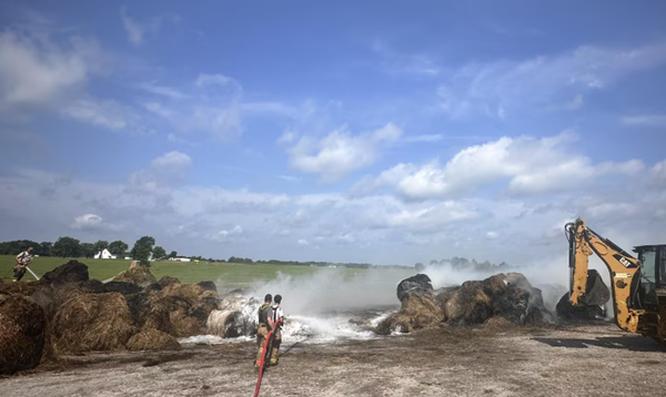 Smoldering hay bales, high winds cause visibility issues in Lyon County