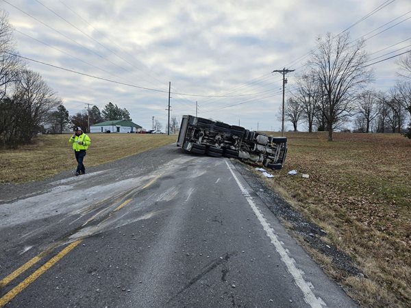 Overturned dump truck blocked KY 453 in Livingston County injuring the driver