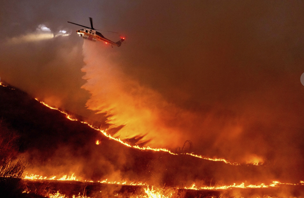 Winds that fueled L.A. fires expected to calm, give firefighters chance to corral flames