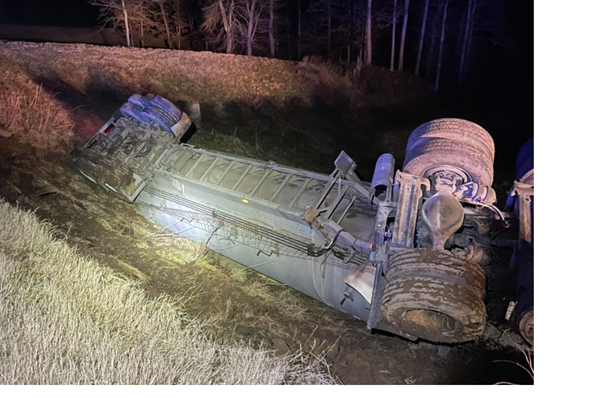 Grain truck overturns in Graves County